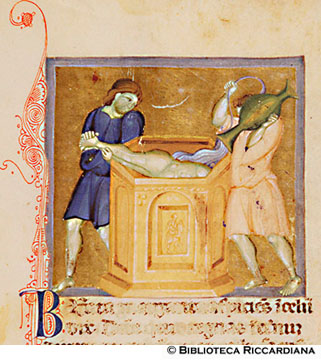 S. Margherita torturata a testa in giù nell’acqua, c. 23r